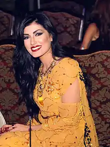 A Kurdish woman smiling