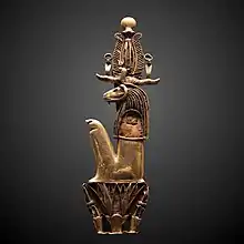 Amulet in the form of Heryshaf seated on a lotus; 1069–332 BC; gold; height: 11.5 cm, width: 3.4 cm; Louvre