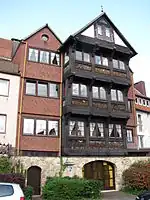 Half-timbered house (1981) built on the medieval city wall in Mühlenstraße