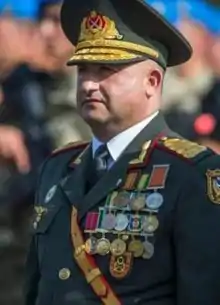 Hasanov at a military parade in Baku in mid-2018.