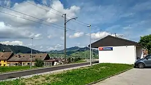 Covered shelter next to side platform