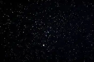 The Hyades is a naked-eye open cluster in the constellation of Taurus. Aldebaran is bright star in bottom-middle. The "V" of Taurus is pointing to the top-right corner.