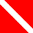 A red flag with white diagonal band