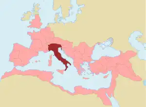 Roman Empire at its greatest extent c. 117 AD, with Italy in red and provinces in pink.