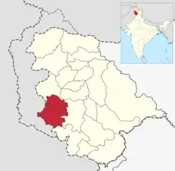 Rajouri district is in the Jammu division (shown with neon blue boundary) of Indian-administered Jammu and Kashmir (shaded in tan in the disputed Kashmir region