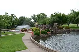 Bridge over lake and water fountain