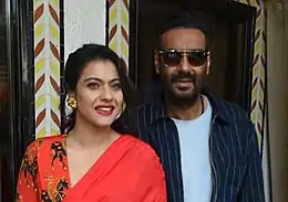 Photograph of Kajol and Ajay Devgn.