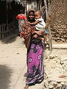 Image 19A woman in Kenya wearing kanga (from Culture of Africa)