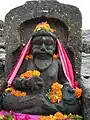 Statue of Kapila Muni on the bank of Kapila River, Nashik