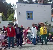 Actors playing the story in front of the visitors