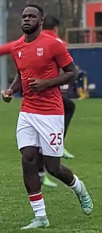 Soccer player jogging during warm-up