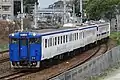 KiHa 47 9031 in August 2007, AQUA LINER livery on Kashii Line