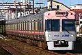 Salmon pink liveried set 1710 in December 2022