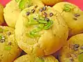 Kesar peda with Garnishing of Pistachio and Cardamom