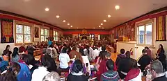 Khenpo Karthar resting in state in the main shrine room at Karme Ling