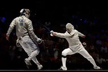 Image 212013 World Fencing ChampionshipsPhotograph: Marie-Lan NguyenNikolay Kovalev (R) attacks Áron Szilágyi (L) in the semi-finals of the men's sabre event at the 2013 World Fencing Championships. Although Kovalev won, he lost in the final against Veniamin Reshetnikov.Held in Budapest, Hungary, from 5 to 12 August, the 2013 Championships saw 827 fencers from 101 countries compete. Russia won the most medals (11), followed by Italy (6) and Ukraine (4).More selected pictures