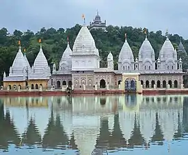 Jain temples near Vardhmansagar lake, 19th CE. Bhagbali Pande temple of 18th CE at the hill top.