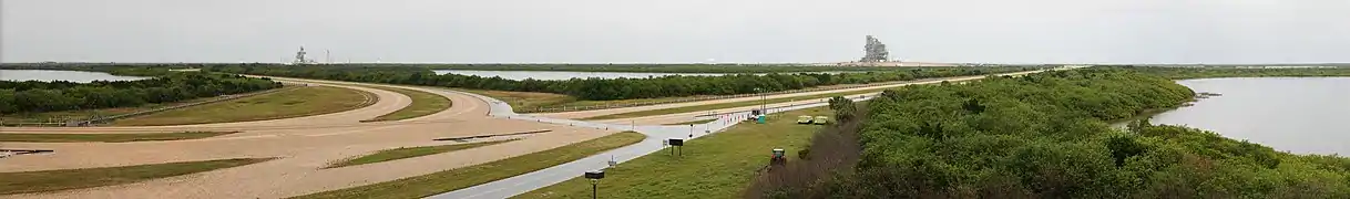 Crawlerway junction at the LC-39 observation gantry. The right track leads to pad LC-39A (pictured with Space Shuttle Endeavour ), while the left track leads to pad LC-39B.