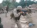 U.S. Marine firing an East German MPi-KMS-72.