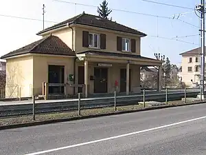 Two-story building with hipped roof