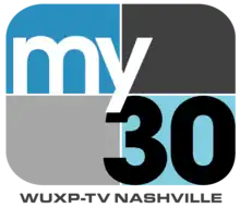 A rounded rectangle divided into blue and gray parts with the word "my" in white and a black "30" in the lower right. Underneath is the text "W U X P TV Nashville".