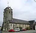 The church : known 12th c., frescos 16th c., extension and steeple 19th c., cover 20th c.