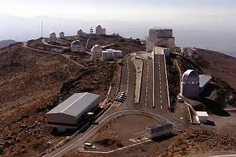 Ramps lead to the NTT. The Euler Telescope is to the right. (Seen from the ESO 3.6 Telescope.)