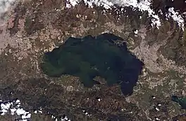 Aerial view of Lake Valencia experiencing a large cultural eutrophication flux due to untreated wastewater discharging into the lake