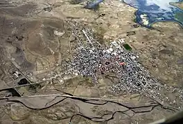 The town of Lampa and parts of the lake Pukaqucha as seen from the air