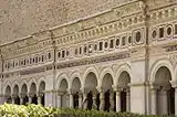 The cloister of the attached monastery, with a cosmatesque decoration.