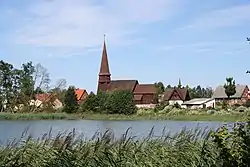 Panorama of Leśno with the historic church of the Exaltation of the Holy Cross