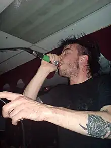 Cormier performing at a Cancer Bats show in Barcelona in June 2008