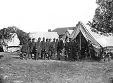 President Lincoln with Gen. George B. McClellan and group of officers at Grove Farm