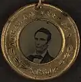 Campaign button for Abraham Lincoln, 1860, on flip side his vice presidential running mate Hannibal Hamlin