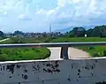 The Linggi River near Rantau. The Titiwangsa Mountains can be seen in the background.