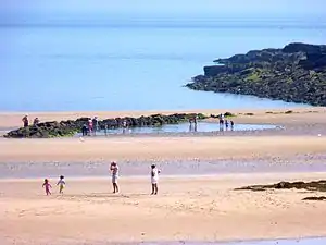 Fish trap built near the low-tide mark of Lligwy Bay.