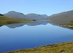 Loch a' Bhraoin With Slioch poking out behind Beinn Bheag in the distance.