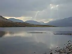 With the Fisherfield hills in the distance.