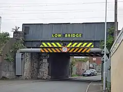 Collision prevention beam installed in front of this bridge