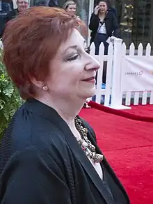 woman standing at red carpet