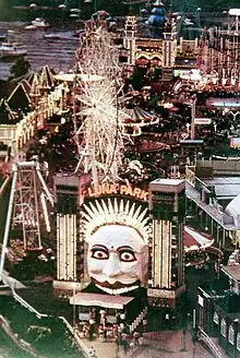 A view of Luna Park, Sydney, with its signature giant 'face' staring out from between two art deco columns, circa 1982.