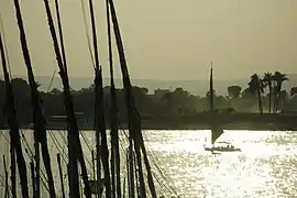 Sunset on Nile River in Luxor, Feluccas