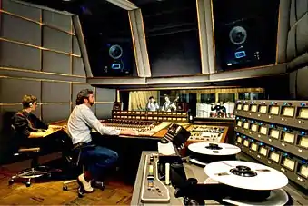 Image 26Musicians working in a recording studio (from Music industry)