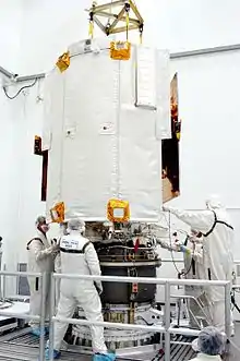 Attachment of the Payload Assist Module to MESSENGER. The ceramic-cloth sunshade is prominent in this view