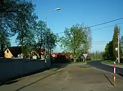 Houses by the roadside in Kuczków