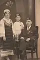 An immigrant family from the village of Banitsa (today's Vevi, Florina region) wearing MPO hats, c. 1930