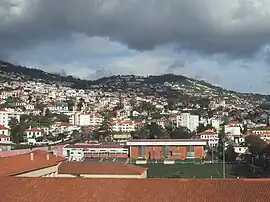 The urbanized coastal buildings of Santa Maria Maior situated in a mountainous geography