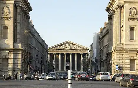 The view of the church along Rue Royale from the Place de la Concorde. The strict harmony of the buildings was assured by a royal decree  in 1824.