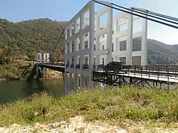 A suspension bridge over the Mae Kuang Udom Thara Dam