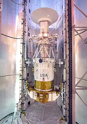 Magellan being fixed into position inside the payload bay of Atlantis prior to launch